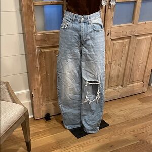 BDG High-waisted wide leg distressed jean in light blue.